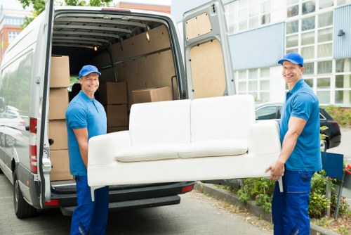 Professional removals team handling boxes in Crystal Palace