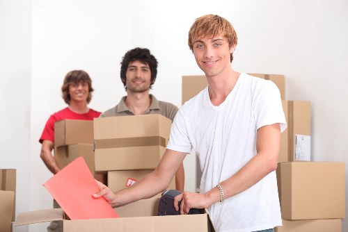 Unloading boxes and furniture into a new Crystal Palace property