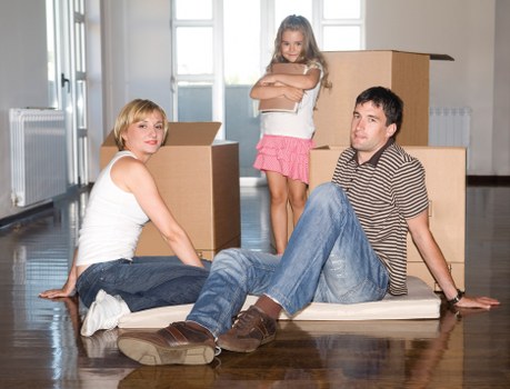 Estimator reviewing a load-based removals quote for a home move